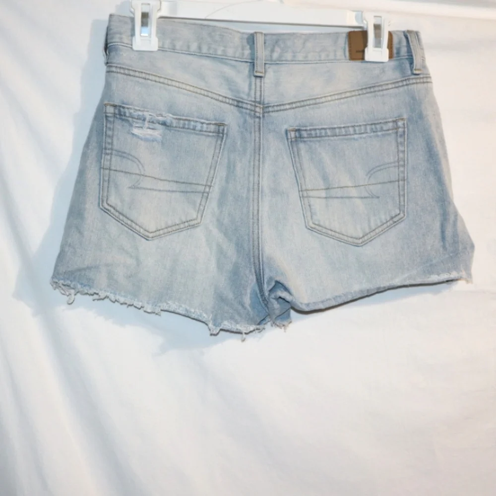American Eagle Light Wash Jean Shorts With Snap Sides - Picture 9 of 12